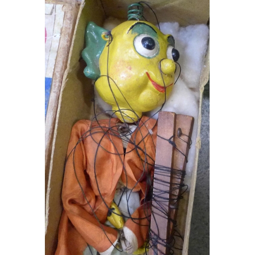 765 - An Armand Marseille doll, other dolls, a Pelham puppet Mr Turnip, boxed, etc.