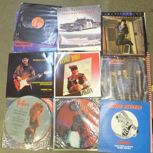 766 - A collection of picture discs and 12