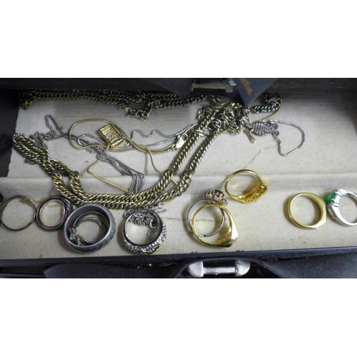 783 - A collection of costume jewellery and a jewellery box including two pairs of 9ct gold earrings and a... 