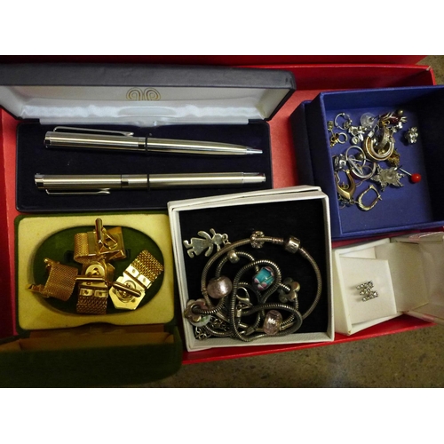 794 - A box of costume jewellery, pen and pencil set, cufflinks, Swarovski pendant and chain, silver Pando... 