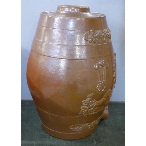 807 - A saltglaze flagon, lacking tap, 37cm