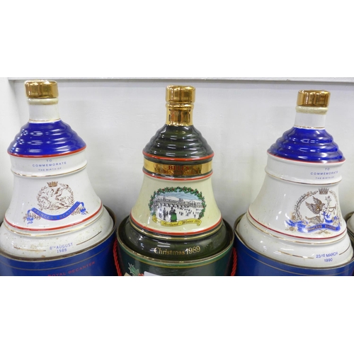 817 - Five Bell's Old Scotch Whisky decanters in containers; three Extra Special