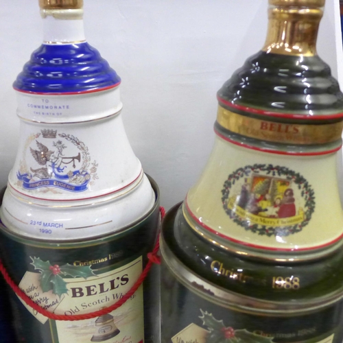 817 - Five Bell's Old Scotch Whisky decanters in containers; three Extra Special