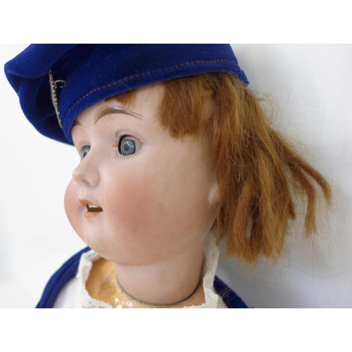 828 - A German Goebel bisque head doll with pale blue sleep eyes, 120 5 Bavaria identification mark, circa... 