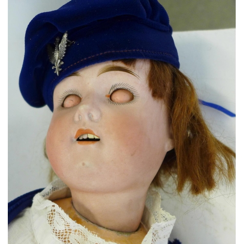 828 - A German Goebel bisque head doll with pale blue sleep eyes, 120 5 Bavaria identification mark, circa... 