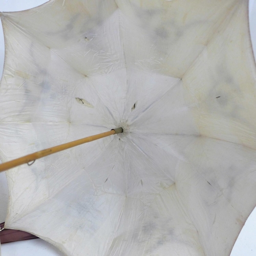 839 - A parasol with embroidered and beaded decoration and a circa 1960's umbrella