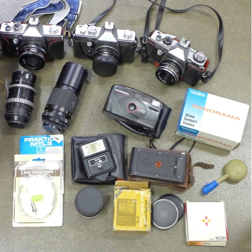 843 - Three Praktica 35mm film cameras with lenses; LB, LTL3 and MTL3, two additional zoom lenses, flash g... 