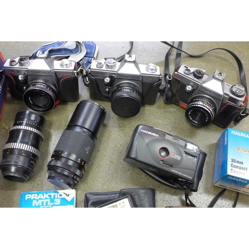 843 - Three Praktica 35mm film cameras with lenses; LB, LTL3 and MTL3, two additional zoom lenses, flash g... 