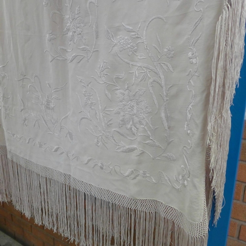 848 - A c1900 ivory silk piano shawl, size 74