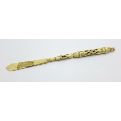 859 - A carved letter opener, (a/f and lacking Stanhope)