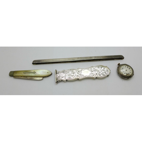 925 - A silver cased watch, a/f, a Victorian silver handle, a silver comb back and a silver and mother of ... 