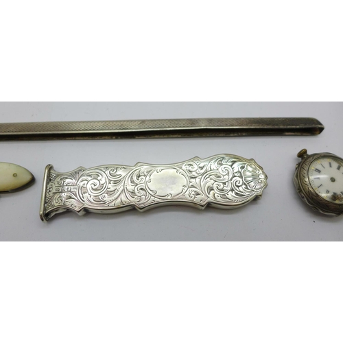 925 - A silver cased watch, a/f, a Victorian silver handle, a silver comb back and a silver and mother of ... 