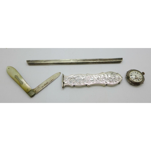 925 - A silver cased watch, a/f, a Victorian silver handle, a silver comb back and a silver and mother of ... 