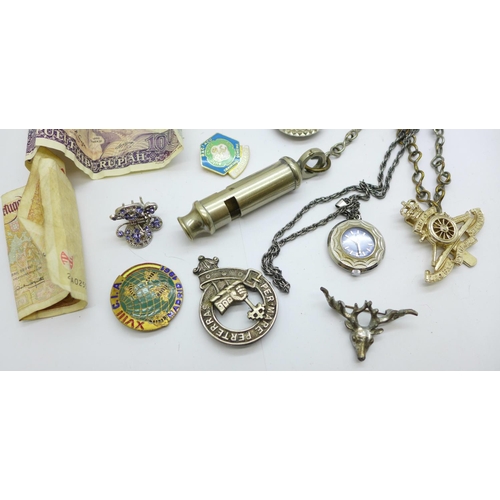 928 - Assorted items including a scent bottle, badges, a whistle with broad arrow, etc.