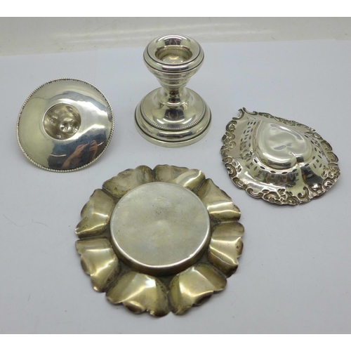 932 - Two silver dishes, a silver candle holder and a novelty 925 silver hat, weight without candle holder... 