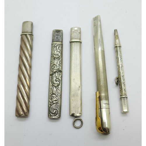 933 - Three silver pencil holders, including one Mordan, a silver pencil and a hallmarked silver knife/let... 