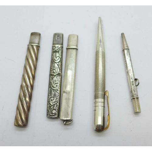 933 - Three silver pencil holders, including one Mordan, a silver pencil and a hallmarked silver knife/let... 