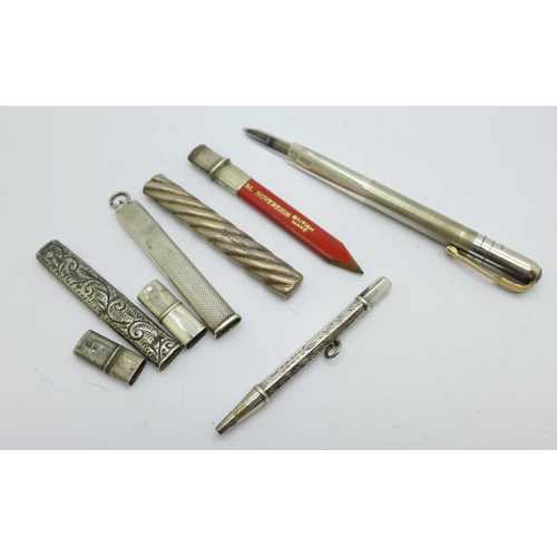 933 - Three silver pencil holders, including one Mordan, a silver pencil and a hallmarked silver knife/let... 