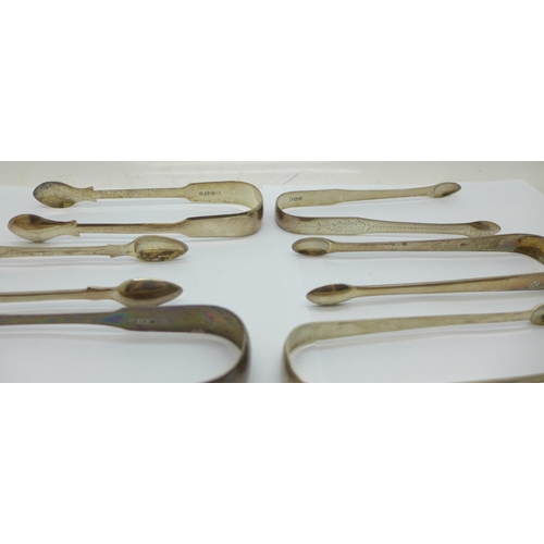 937 - Ten pairs of silver sugar tongs, 284g, and one plated pair