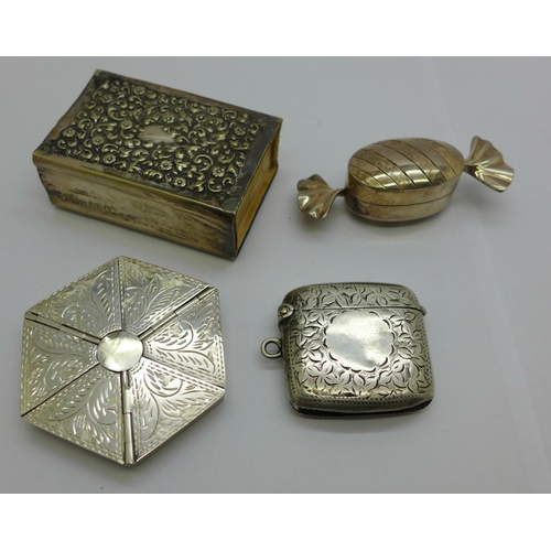 939 - Two hallmarked silver pill boxes including one hexagonal shaped and with six compartments, a plated ... 