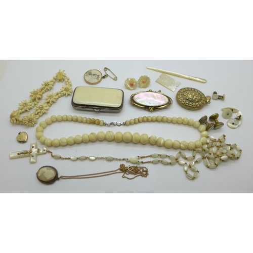 980 - Costume jewellery including a Victorian mother of pearl brooch, beads, earrings, rosary beads, locke... 