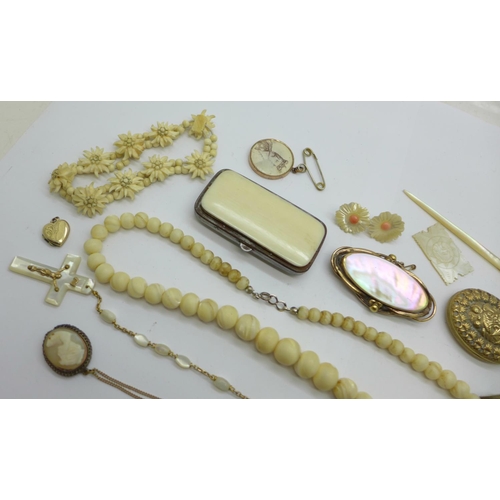 980 - Costume jewellery including a Victorian mother of pearl brooch, beads, earrings, rosary beads, locke... 