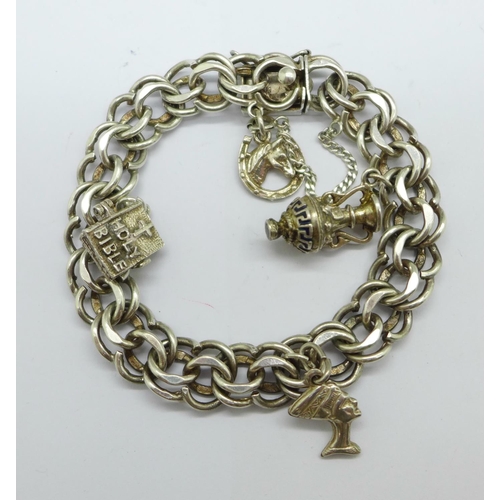 985 - A silver charm bracelet, 37g