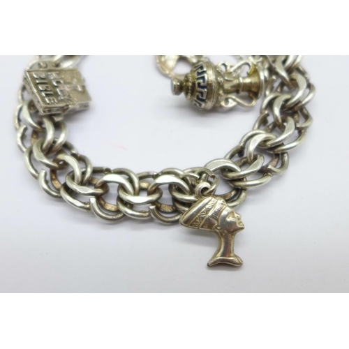 985 - A silver charm bracelet, 37g