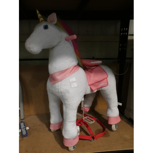 3037a - Pony rider unicorn ride-on toy with red harness RRP £199.99