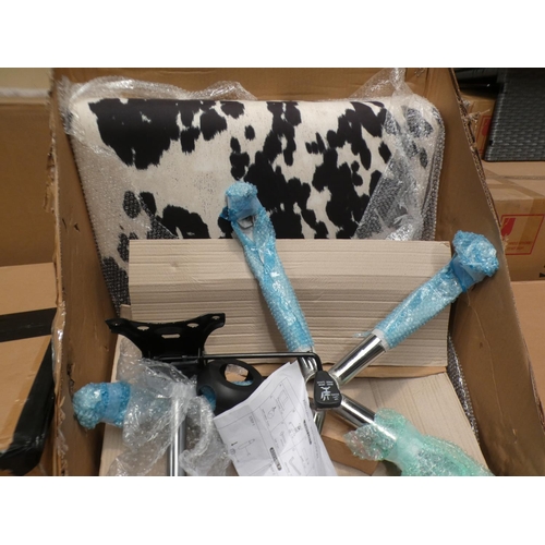 3145 - Cow print fabric swivel chair * This lot is subject to VAT