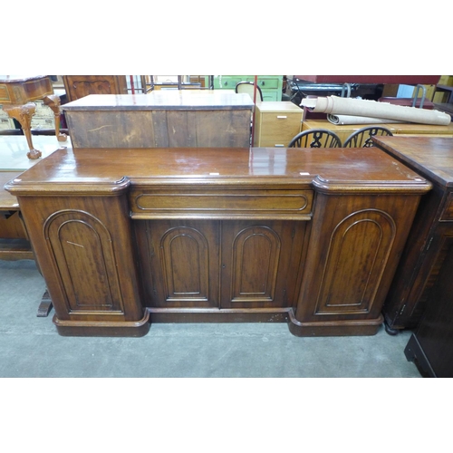 114 - A Victorian mahogany four door breakfront sideboard