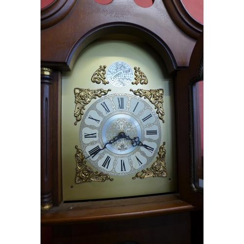 118 - A German mahogany triple weight longcase clock, a/f