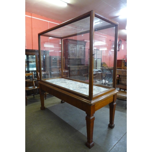 120a - A Victorian glazed mahogany museum cabinet