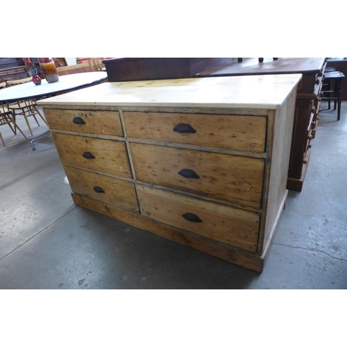 121 - A Victorian pine chest of drawers (with later top)