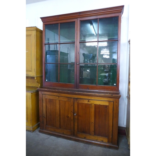 125 - A large Victorian pine country house gun cabinet