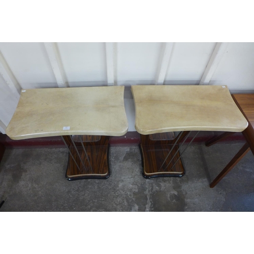 157 - A pair of Art Deco style simulated rosewood and faux marble topped console tables