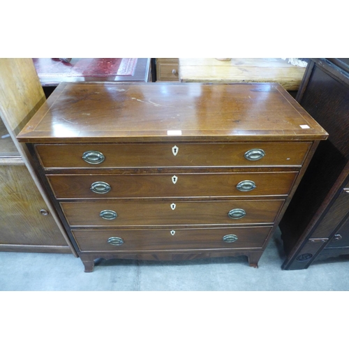 163 - A George III inlaid mahogany chest of drawers