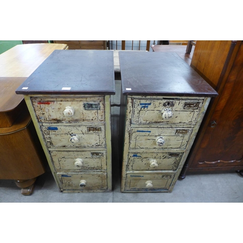 172 - A pair of industrial style painted pine and mahogany four drawer chests