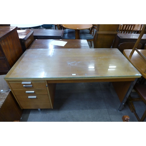 177 - A teak and chrome desk