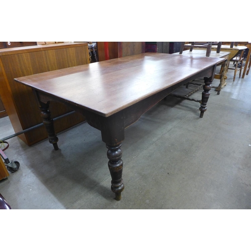 180 - A Victorian mahogany and pine farmhouse kitchen table