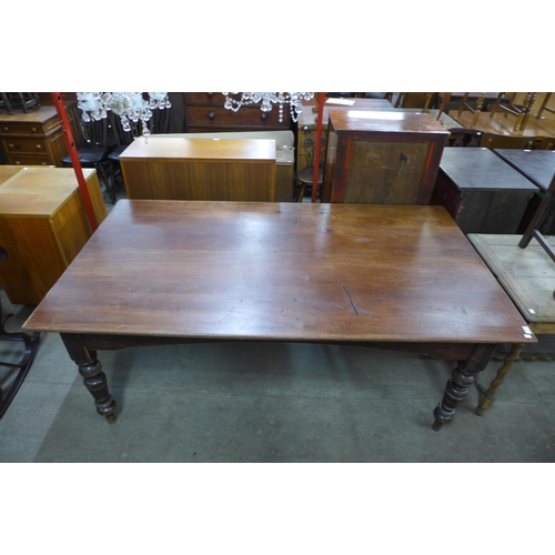 180 - A Victorian mahogany and pine farmhouse kitchen table