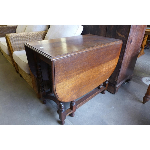 197 - An oak barleytwist gateleg table