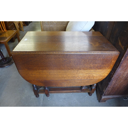 197 - An oak barleytwist gateleg table