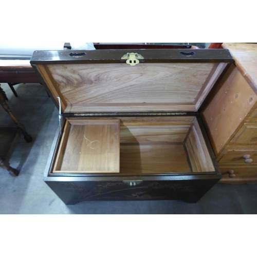 208 - A Chinese camphorwood blanket chest