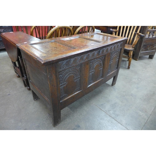 25 - A William III carved oak coffer