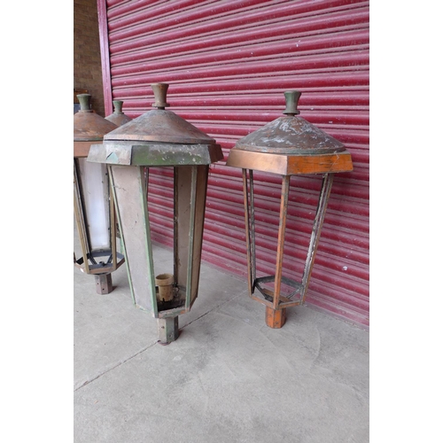 261 - A set of four mid 20 Century bronze and copper lanterns, a/f