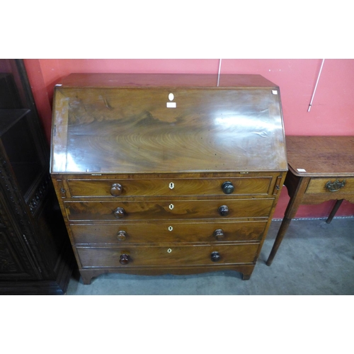 29 - A George III mahogany bureau