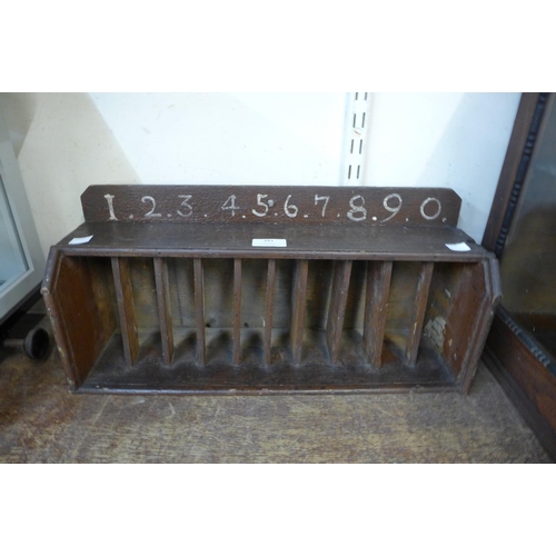 341 - A Victorian pine pigeon hole docket rack