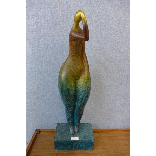 355 - An abstract bronze figure of a lady