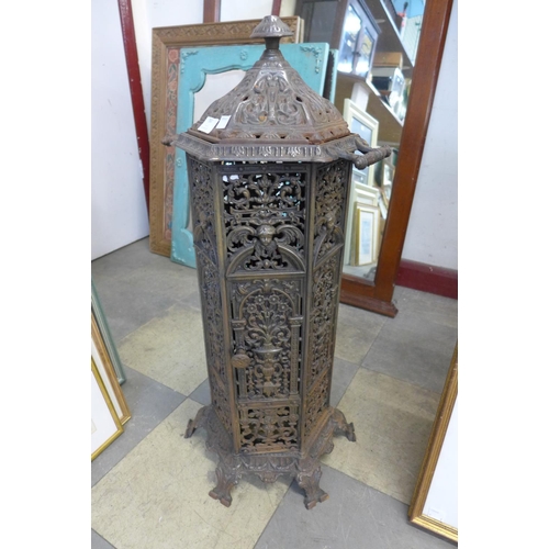 360 - A French style cast iron oil lamp and stand